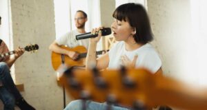 Music Lesson Benefits and Outcomes featured page image. Picture of musicians making music together